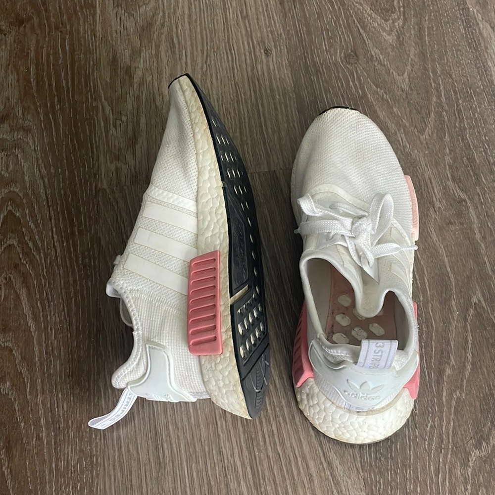 White limited edition NMDs with pink